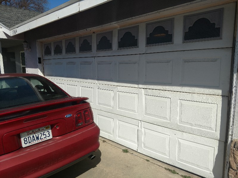 Old, faded garage door